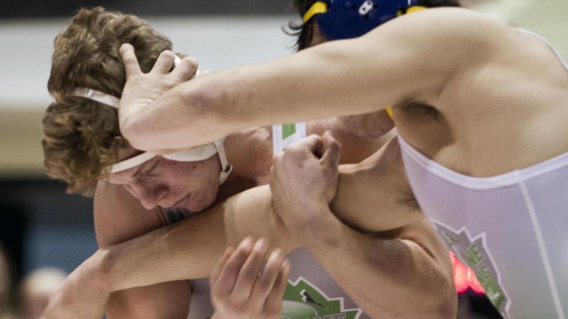 After finishing fifth as a freshman and third as a sophomore, Fruitland junior Jonathon Fagen, left, broke through to win the 182-pound title at the Rollie Lane Invitational on Saturday at Nampa’s Ford Idaho Center. Fagen beat Preston’s Ben Seamons with an 8-3 decision.