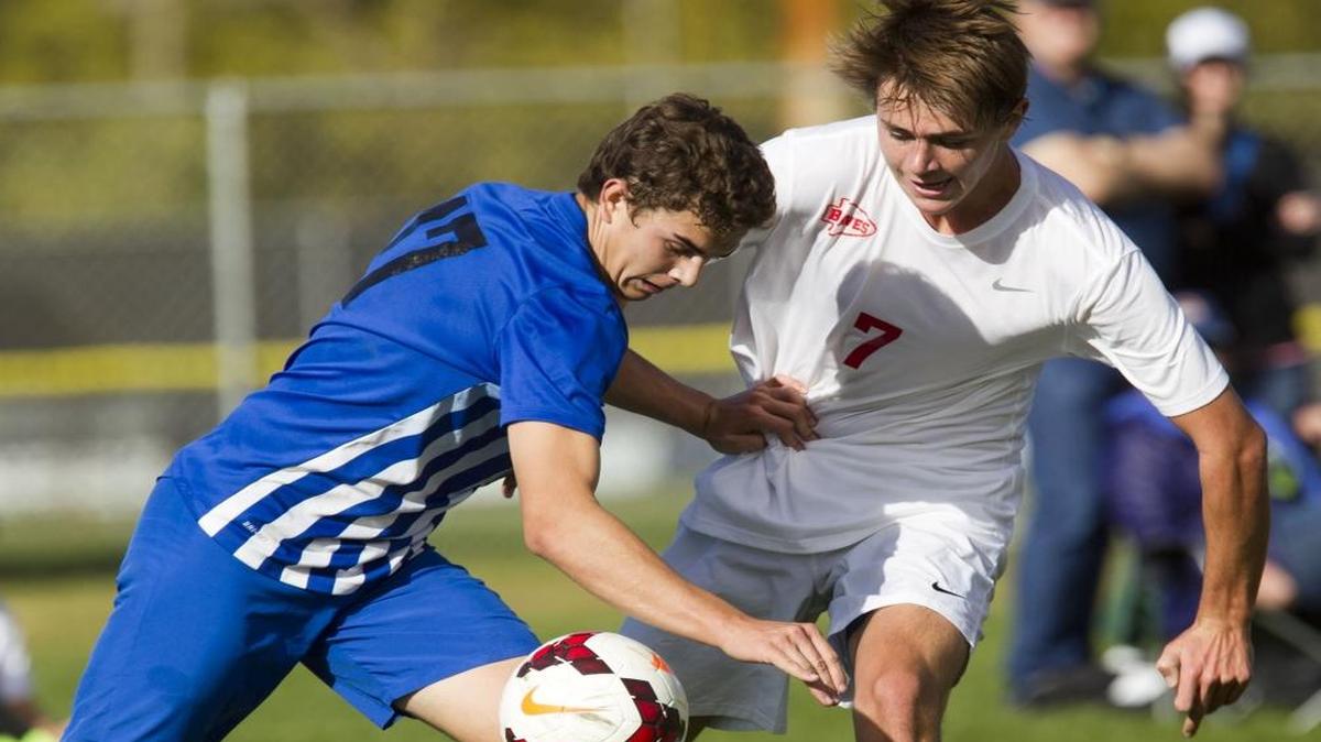 Boise senior Matt Ivanoff fights for the ball during last year’s 5A District Three semifinals at Timberline High.