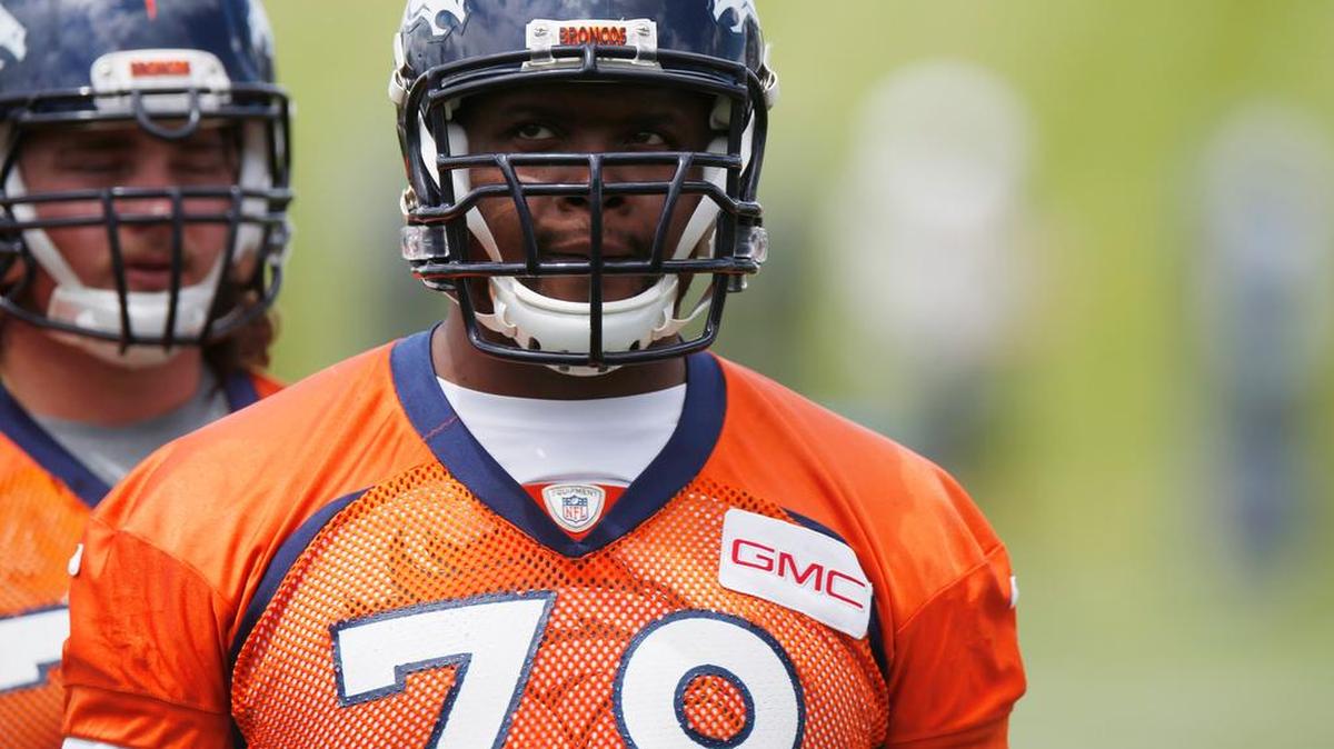 In this May 27, 2015, file photo, Denver Broncos offensive tackle Ryan Clady waits to take part in drills at the team’s headquarters in Englewood, Colo. Clady was a first-round draft pick of the Broncos in 2008.