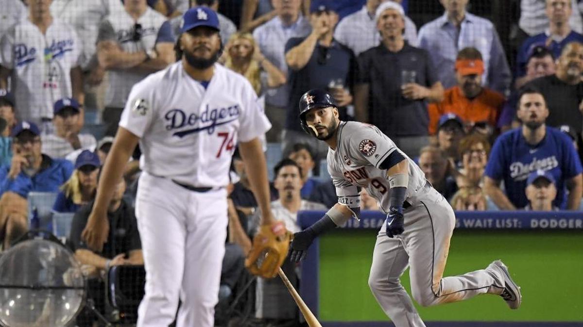 Houston’s Marwin Gonzalez watches his home run off Los Angeles Dodgers relief pitcher Kenley Jansen during the ninth inning of Game 2 of the World Series on Wednesday.