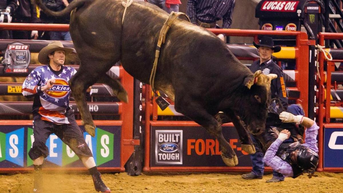 Mike Lee from Paradise, Texas, is thrown over the head of Funkytown during the Professional Bull Riders event April 11, 2015, at Ford Idaho Center in Nampa.