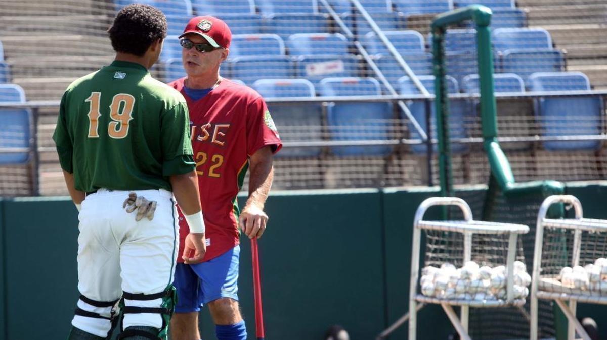 Boise Hawks hitting coach Bill Buckner works with catching prospect Willson Contreras before the start of the 2012 Northwest League baseball season in Boise.