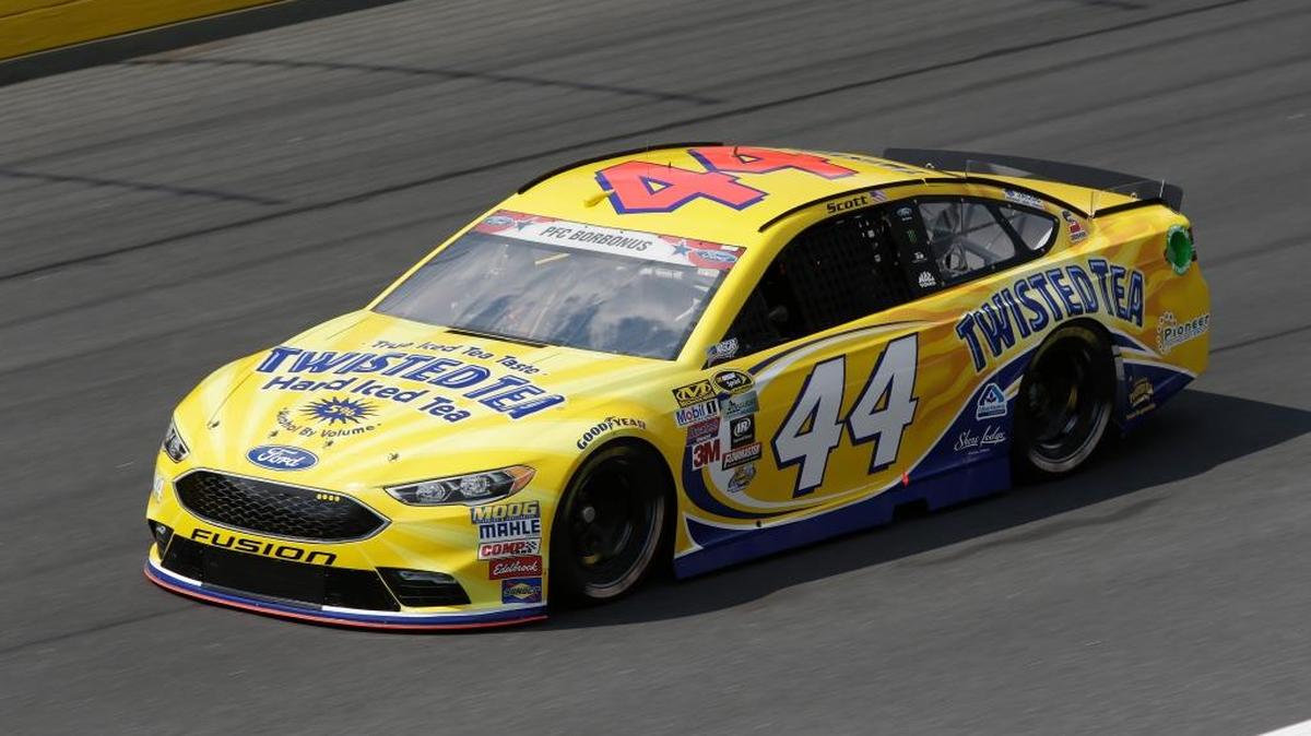 Driver Brian Scott is honoring former Boise High classmate John Borbonus with a nameplate on his windshield this weekend at Charlotte Motor Speedway.