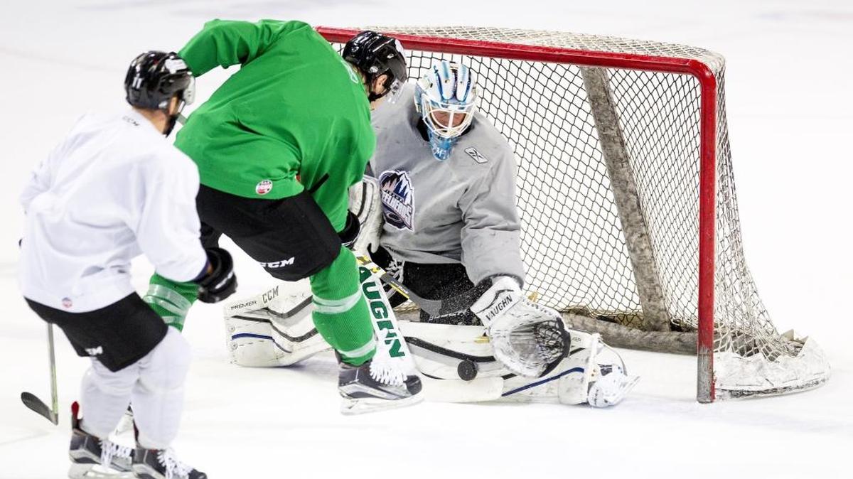 Goalie Branden Komm makes a stop during an Oct. 18, 2016, practice at CenturyLink Arena.