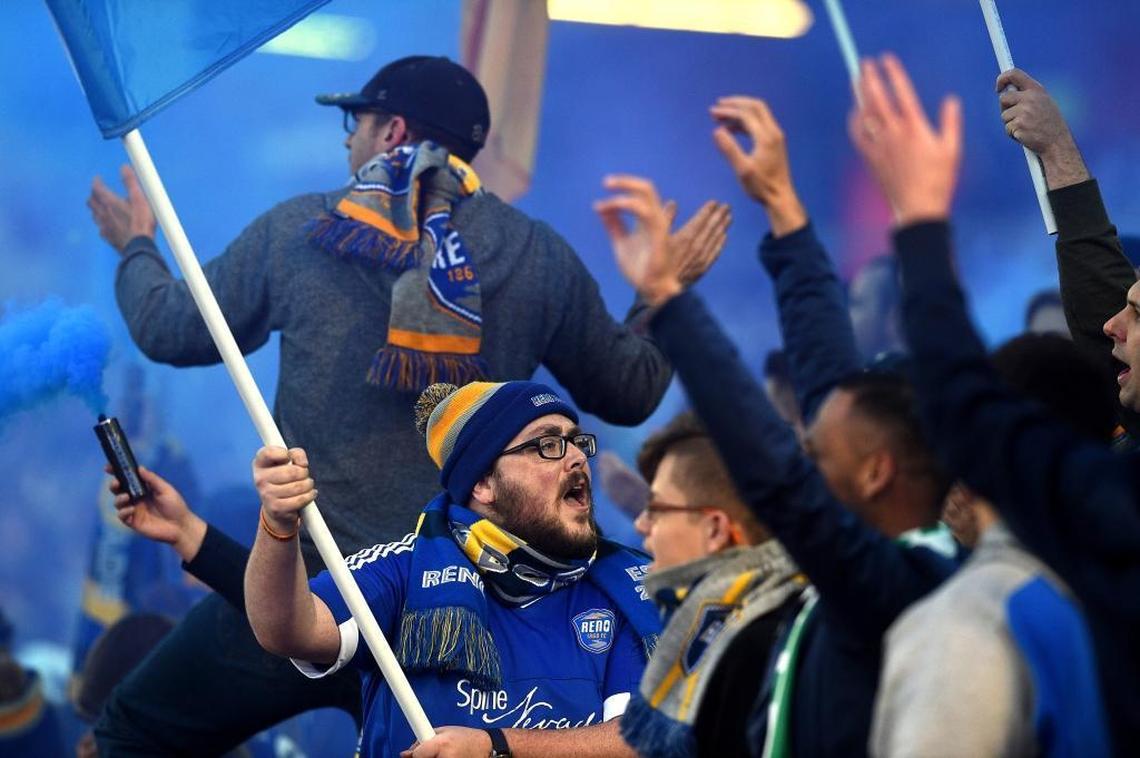The Battle Born Brigade fan group cheers for Reno 1868 FC during its first USL match March 25 at Greater Nevada Field.