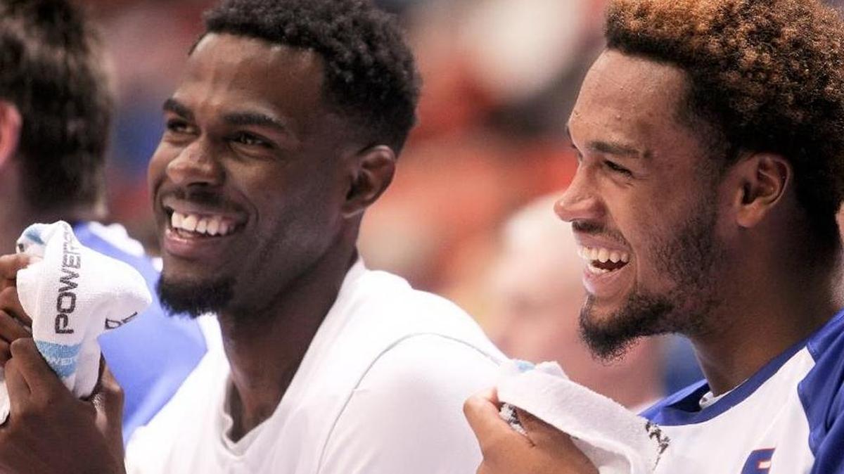 Boise State forward James Webb III, right, laughs with guard Mikey Thompson during the Broncos’ 100-36 win over Willamette on Dec. 2, 2015 at Taco Bell Arena.