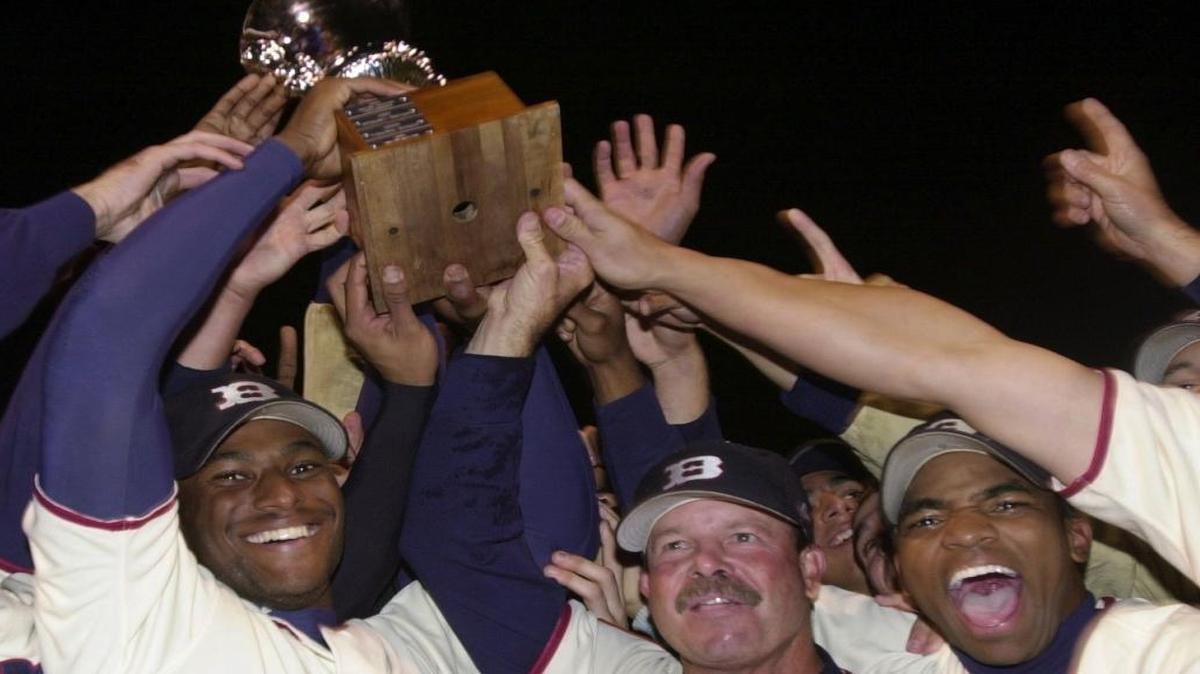 The Boise Hawks celebrate winning the Northwest League championship at Memorial Stadium in 2002. Boise Hawks manager Steve McFarland, center, and his players beat Everett 8-2 to clinch the league title.