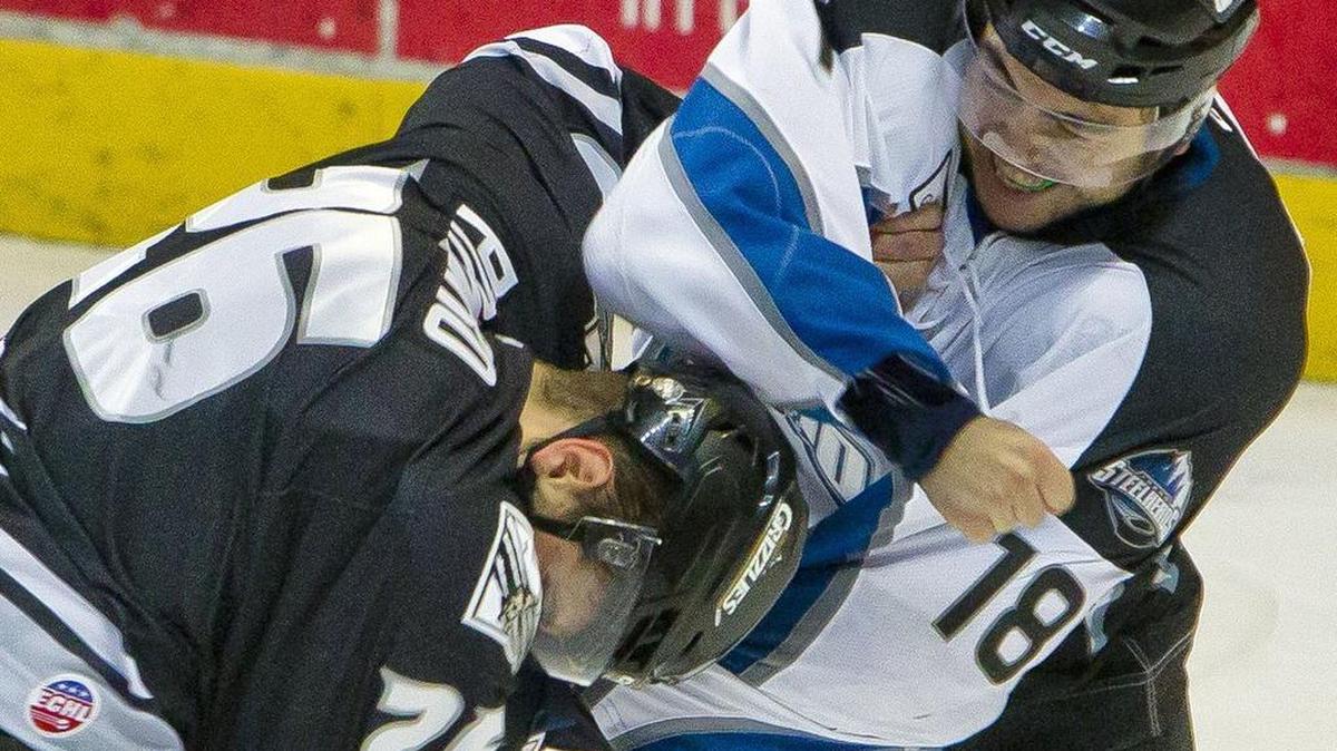 Idaho Steelheads forward Brandon Magee interrupts a Utah first period, four-goal scoring spree with a little fisticuffs against Grizzly Phil Pietroniro on Wednesday at CenturyLink Arena.